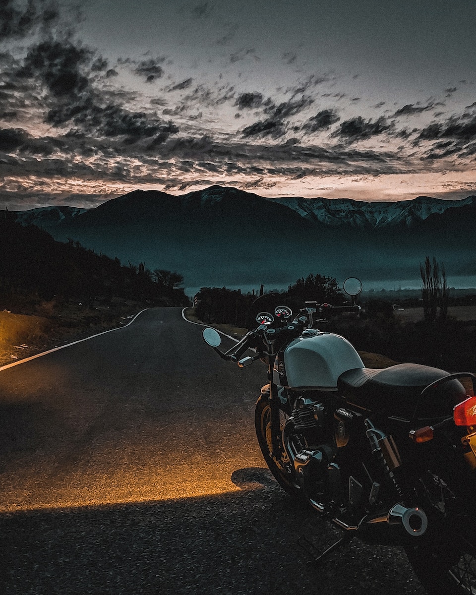 black and silver cruiser motorcycle on road during daytime